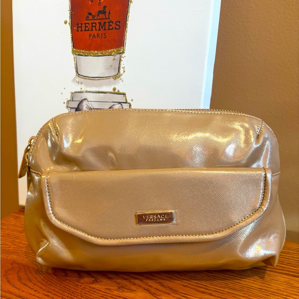 VERSACE COSMETIC GOLD ZIPPERED BAG.  NWOT